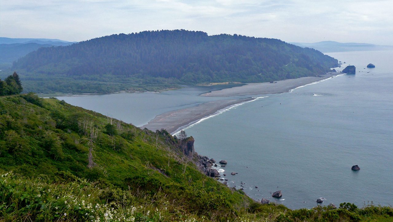 The Klamath River meets ocean, part of the Yurok lands. Photo by Zandcee/Wikimedia.